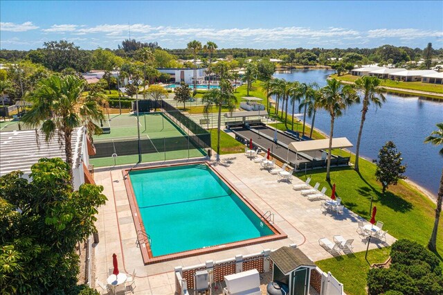 15093 Aguila Ave, Fort Pierce, FL 34951 - view of pool with a patio area and a water view