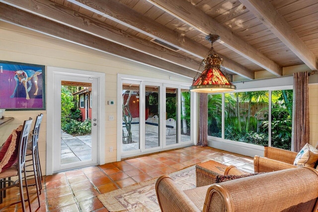 sunroom with wooden ceiling and lofted ceiling with beams