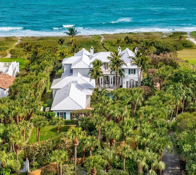 bird's eye view featuring a view of the beach and a water view