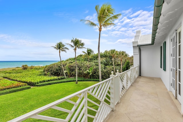 balcony featuring a water view