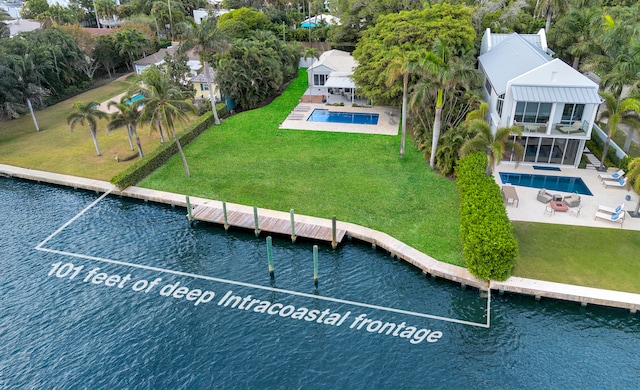 view of dock featuring a water view and a lawn