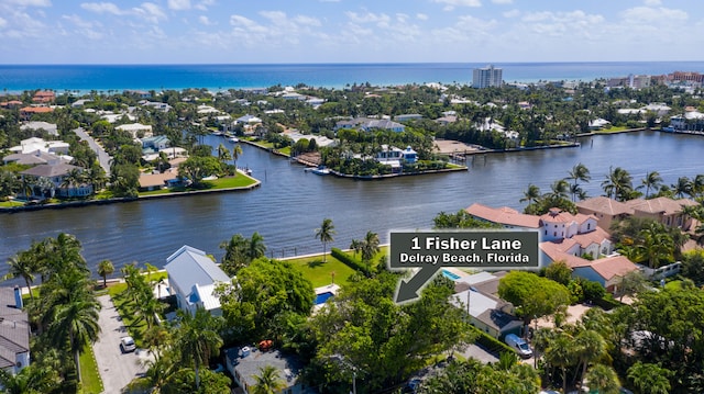 bird's eye view with a water view