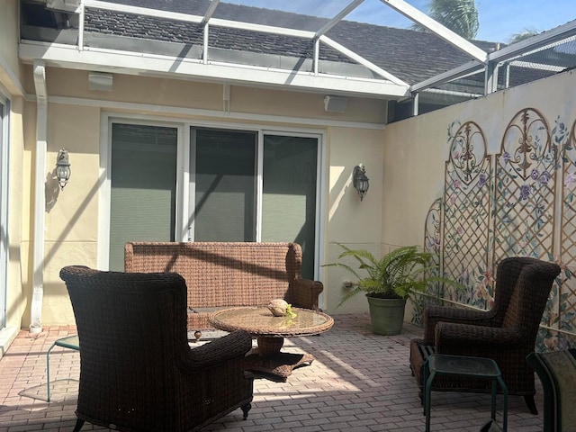 view of patio / terrace with a lanai