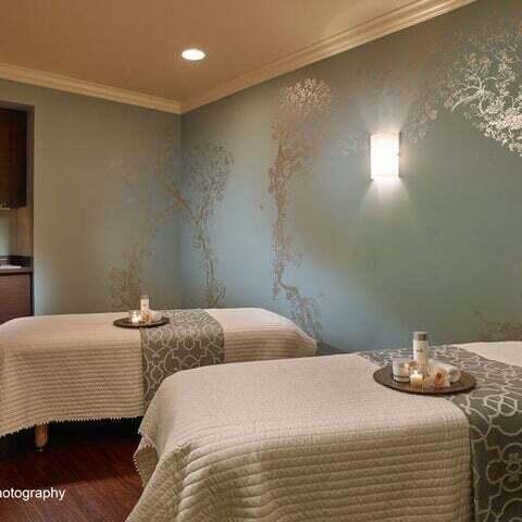 bedroom with ornamental molding and hardwood / wood-style flooring