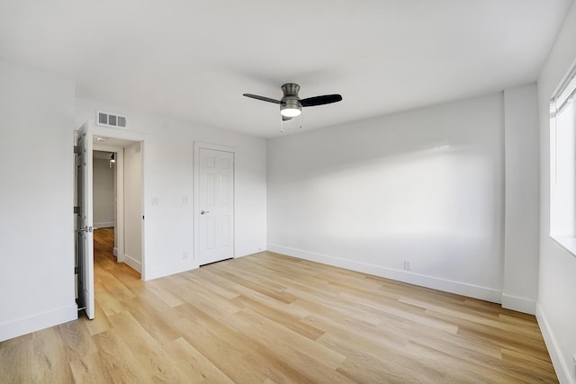 unfurnished bedroom featuring light hardwood / wood-style floors and ceiling fan