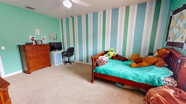 carpeted bedroom with ceiling fan