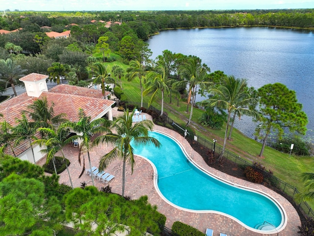 view of swimming pool with a water view