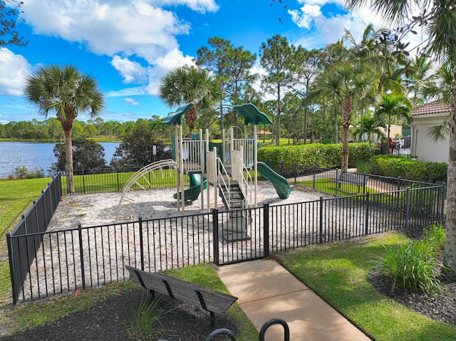 view of jungle gym featuring a water view