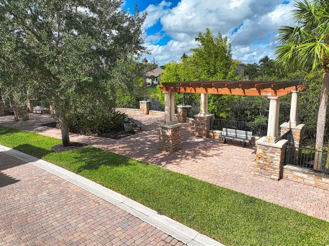 exterior space featuring a pergola