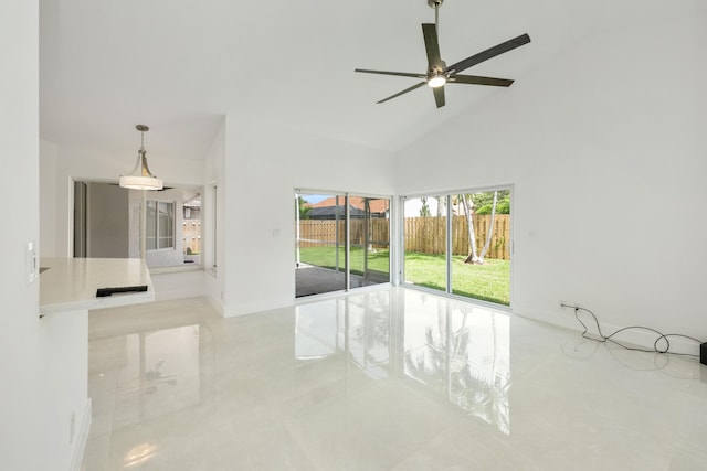 kitchen featuring light stone counters, sink, white cabinets, and stainless steel appliances