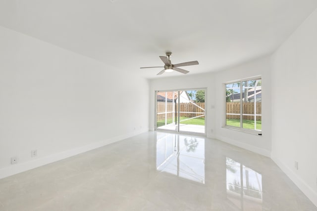 spare room with ceiling fan