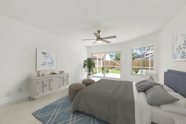 bedroom featuring access to exterior and ceiling fan