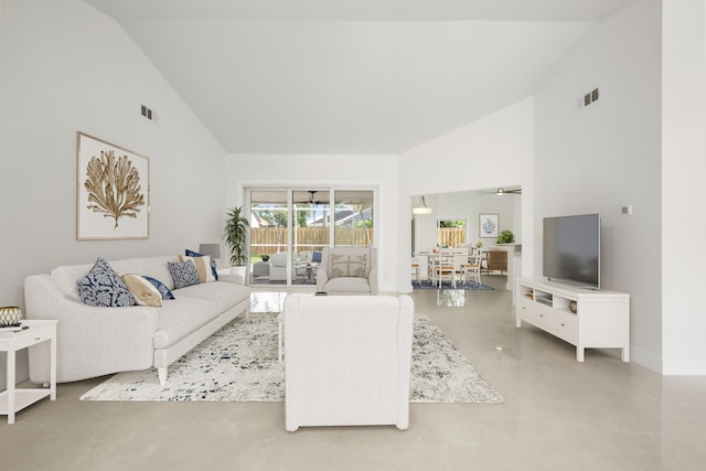 empty room featuring high vaulted ceiling and ceiling fan