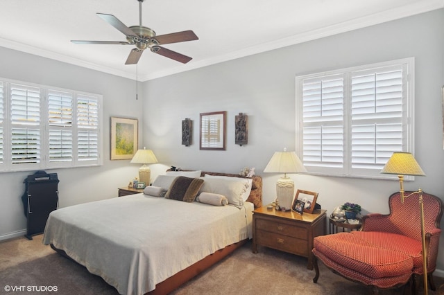 bedroom with carpet flooring, multiple windows, ceiling fan, and crown molding