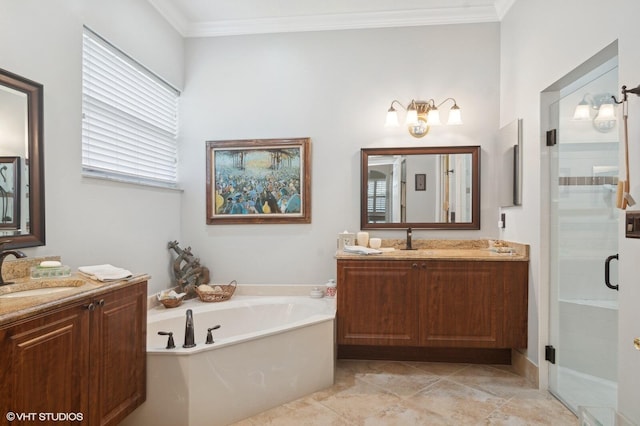 bathroom featuring vanity, ornamental molding, and independent shower and bath