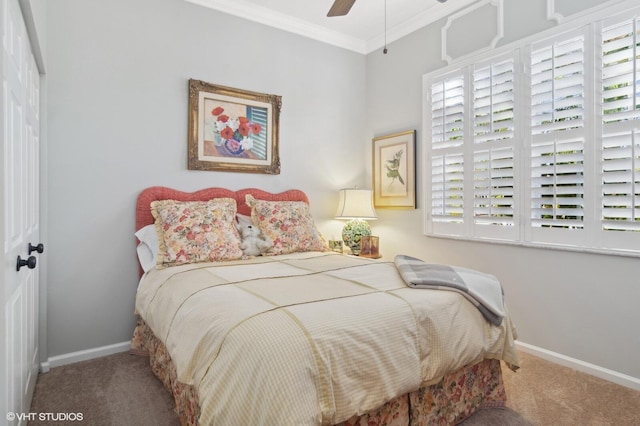 bedroom with ceiling fan, carpet, and ornamental molding