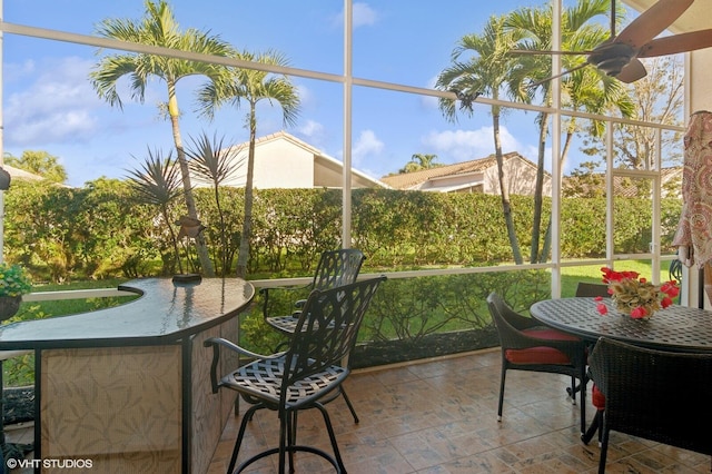 sunroom / solarium featuring plenty of natural light