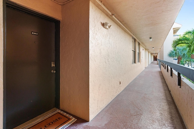 doorway to property featuring a balcony