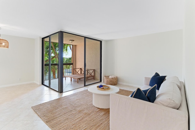 tiled living room with a wall of windows