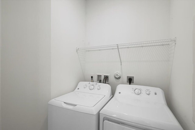 laundry area featuring independent washer and dryer