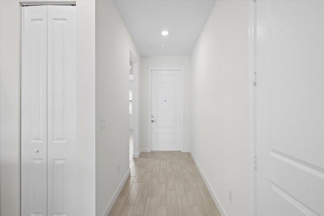 hallway featuring light hardwood / wood-style floors