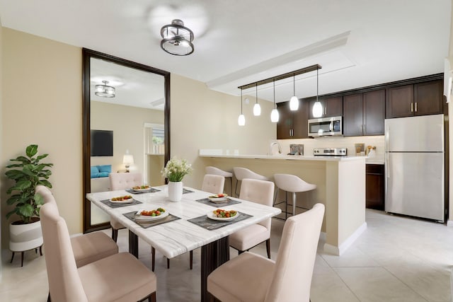 view of tiled dining space