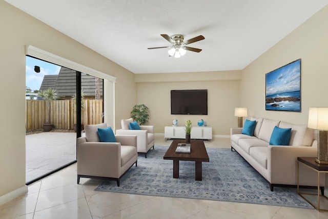 living room featuring ceiling fan