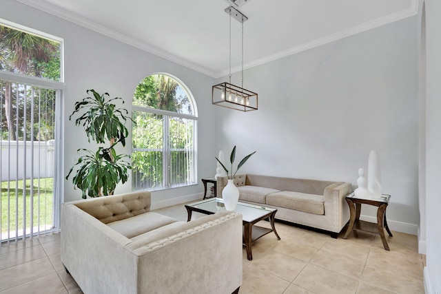 tiled living room with ornamental molding and a notable chandelier