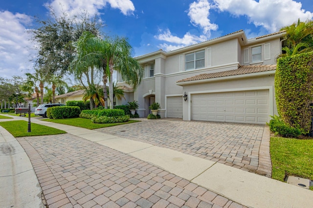 view of front of property with a garage