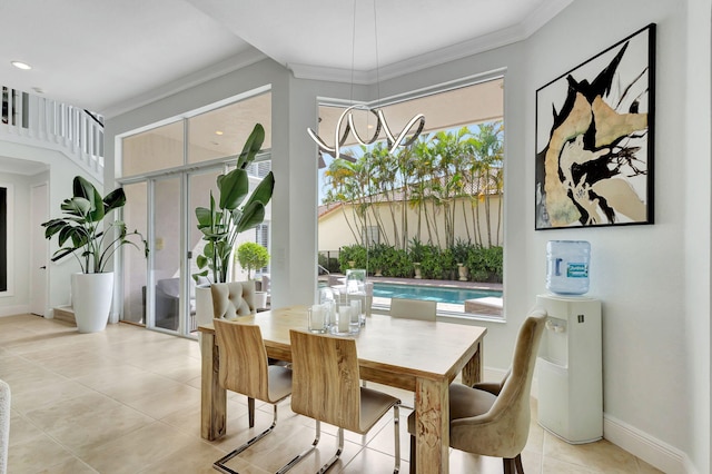 tiled dining room featuring ornamental molding and plenty of natural light