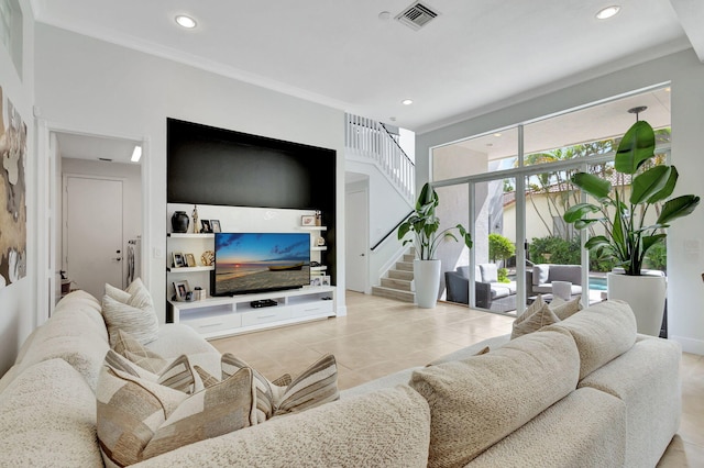 living room featuring light tile patterned floors and ornamental molding