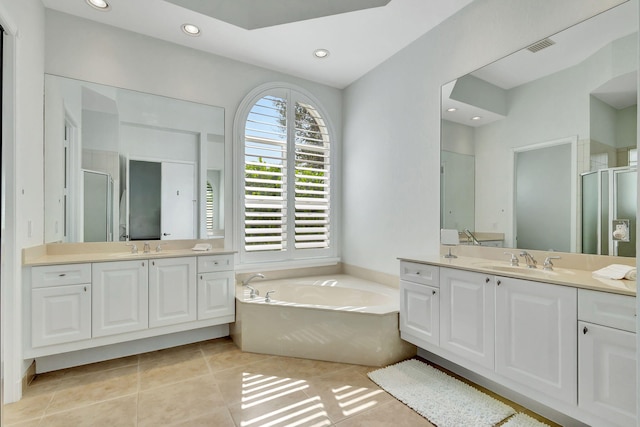 bathroom with vanity, tile patterned floors, and separate shower and tub