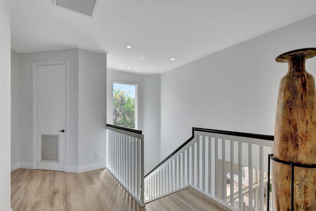 stairs with wood-type flooring