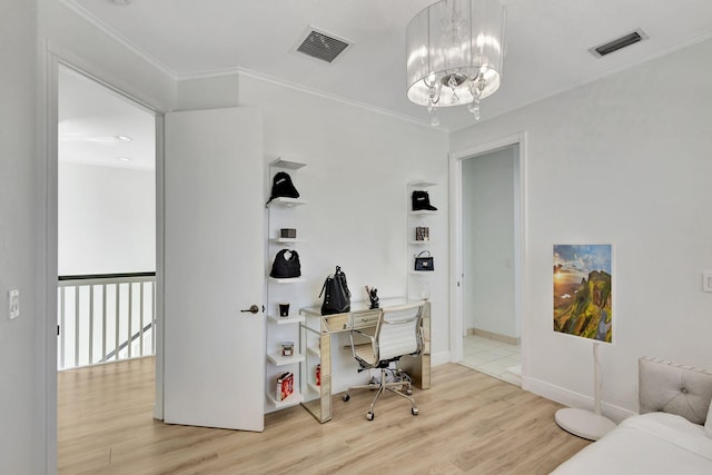 office area featuring hardwood / wood-style floors, an inviting chandelier, and crown molding