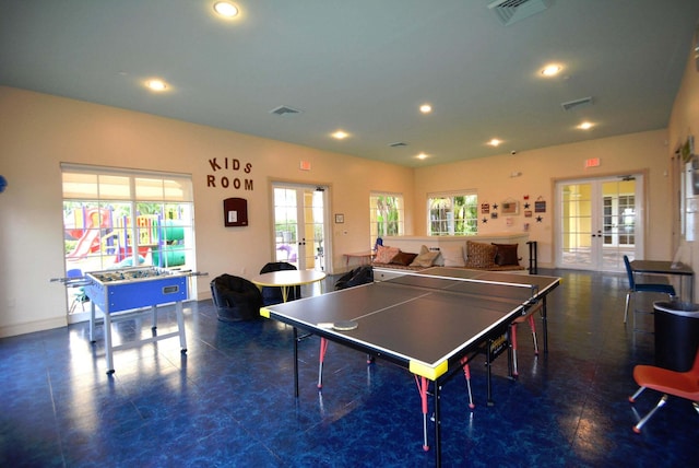 playroom with a wealth of natural light and french doors