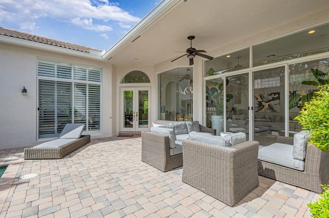 view of patio / terrace featuring french doors, ceiling fan, and an outdoor hangout area