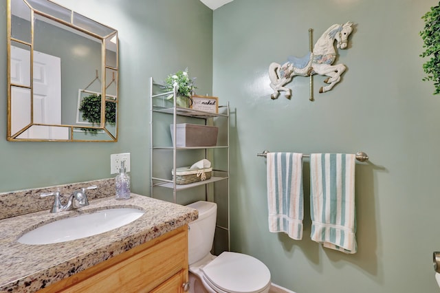 kitchen featuring kitchen peninsula, light stone counters, white appliances, sink, and light tile patterned floors