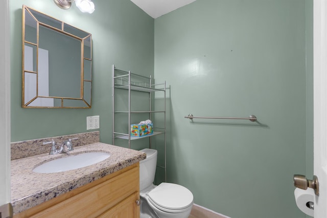 623 Monaco M, Delray Beach, FL 33446 - bathroom with vanity, toilet, and baseboards