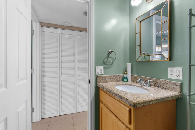 623 Monaco M, Delray Beach, FL 33446 - bathroom featuring tile patterned floors, a closet, and vanity