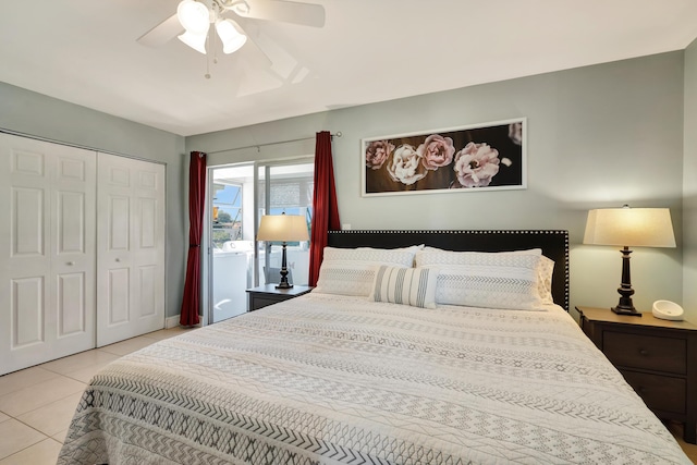 tiled bedroom with ceiling fan, access to outside, and a closet