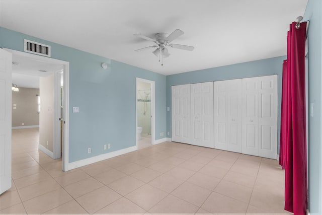 623 Monaco M, Delray Beach, FL 33446 - unfurnished bedroom featuring light tile patterned floors, a closet, ceiling fan, visible vents, and baseboards