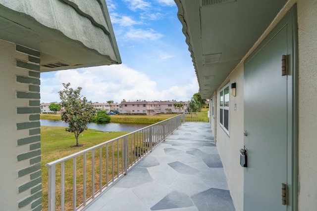 623 Monaco M, Delray Beach, FL 33446 - balcony featuring a porch and a water view