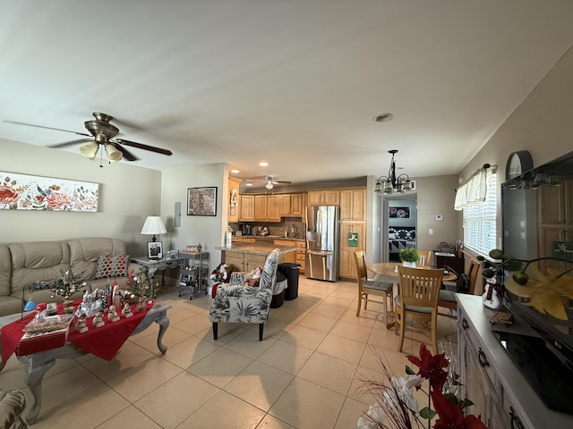 living room with light tile patterned flooring and ceiling fan