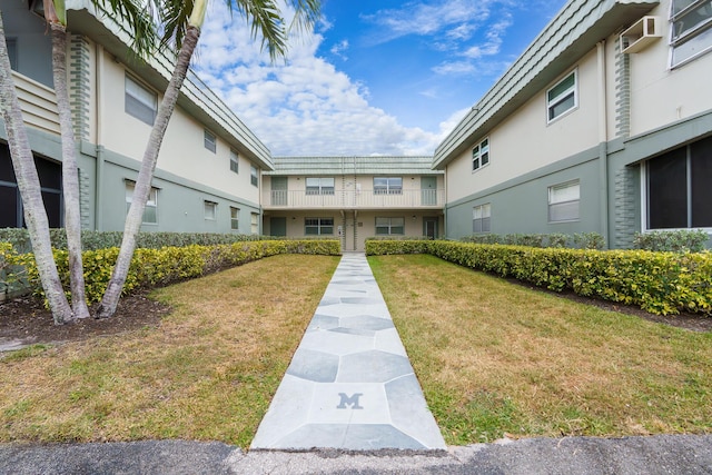 623 Monaco M, Delray Beach, FL 33446 - view of community with a lawn