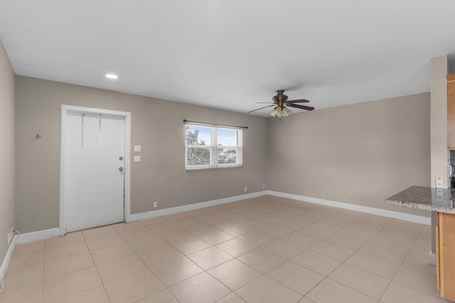 623 Monaco M, Delray Beach, FL 33446 - unfurnished living room featuring light tile patterned flooring, recessed lighting, a ceiling fan, and baseboards
