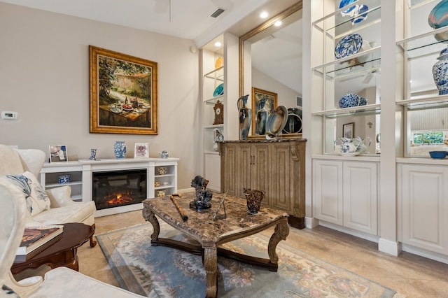 sitting room with ceiling fan