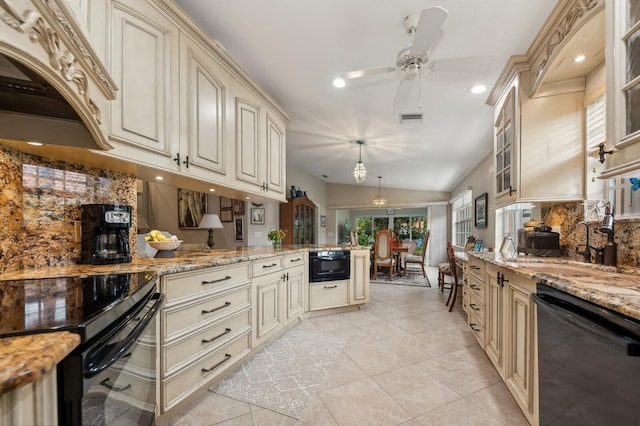 kitchen with lofted ceiling, cream cabinets, black appliances, hanging light fixtures, and light tile patterned floors