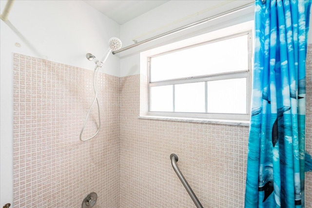 909 Savannas Point Dr Unit A, Fort Pierce, FL 34982 - bathroom featuring a tile shower