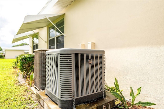 909 Savannas Point Dr Unit A, Fort Pierce, FL 34982 - exterior view of a cooling unit and stucco siding