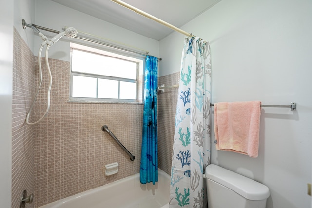 bathroom with toilet and shower / tub combo with curtain